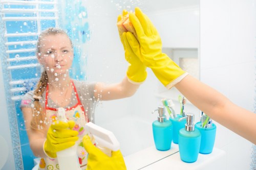 Local carpet cleaner treating carpet stains in Sutton