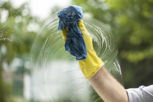 A cleaner reviewing service terms before starting scheduled work