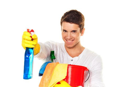 Local window cleaner working on residential glass in Sutton